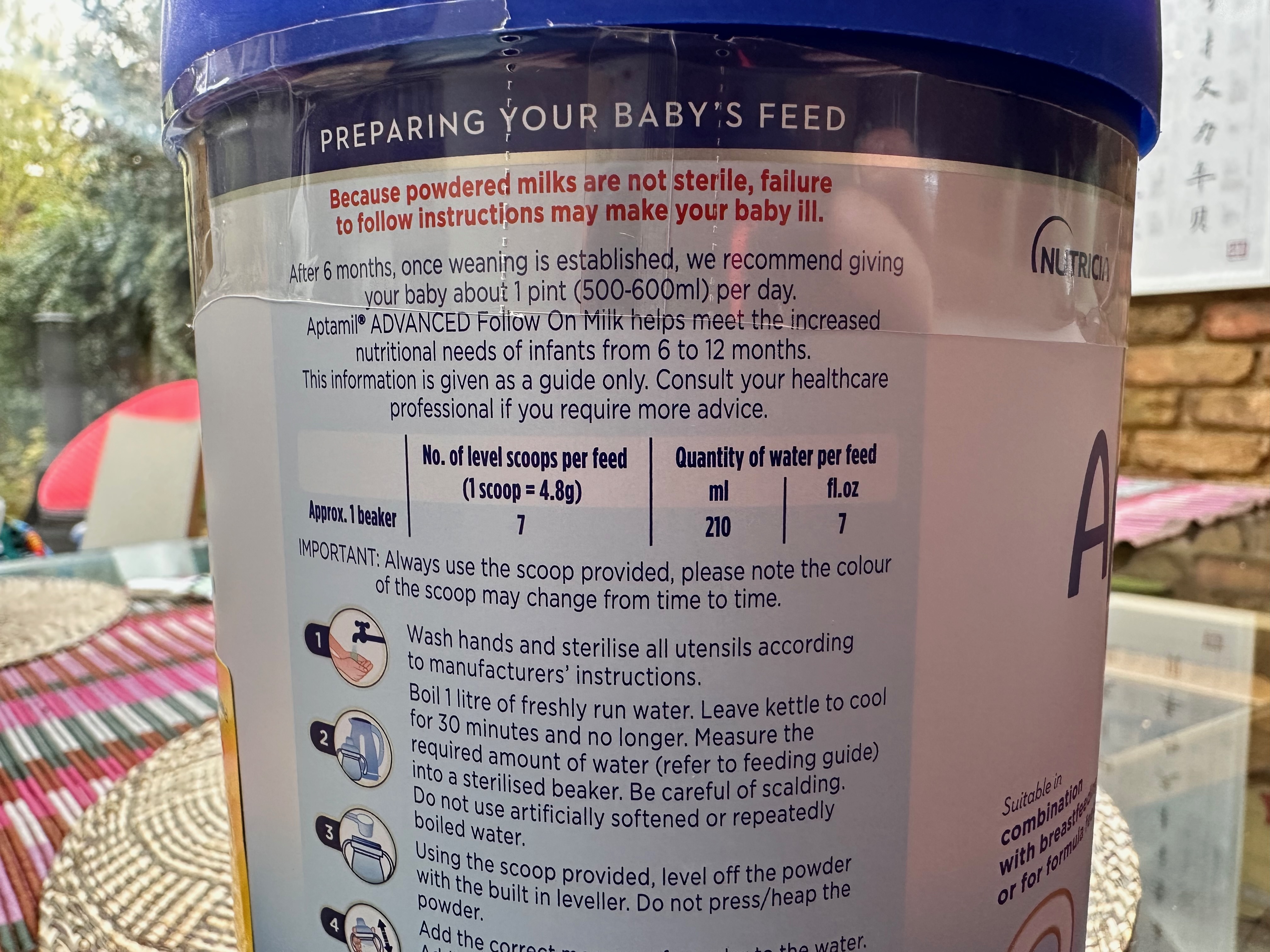 Photograph showing the instructions on the side of formula tub. The instructions are described in the blog post.
