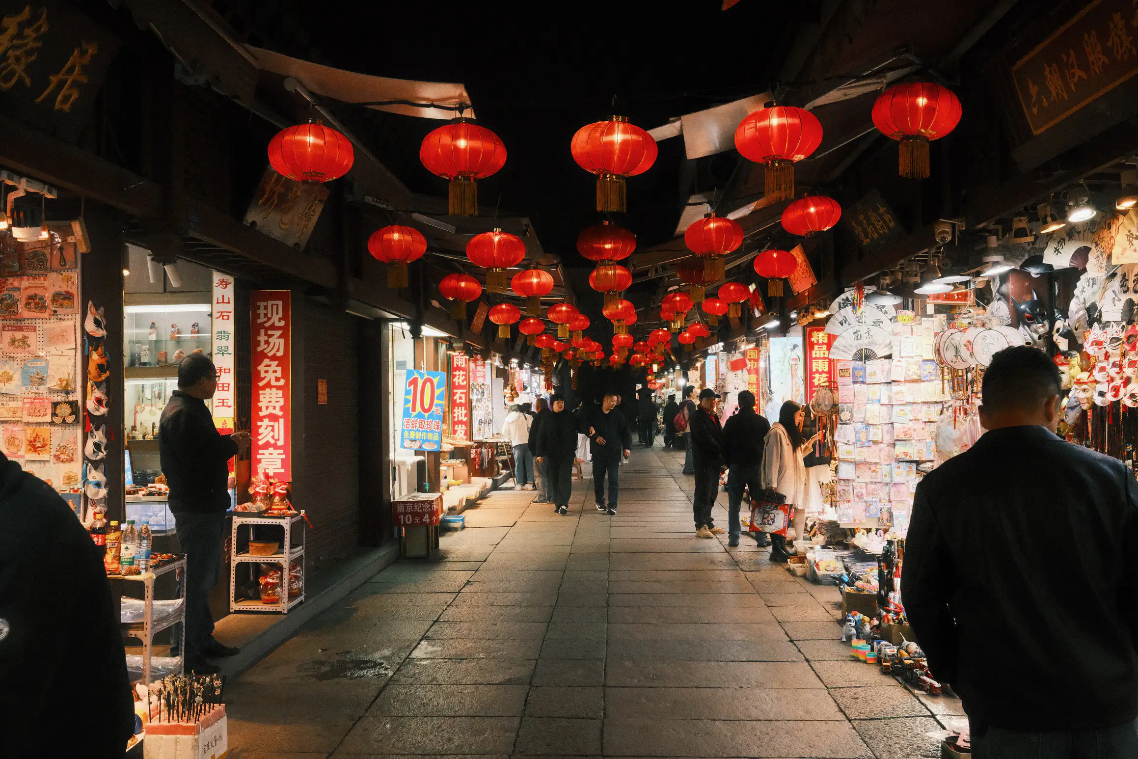 a relatively quiet market street at night
