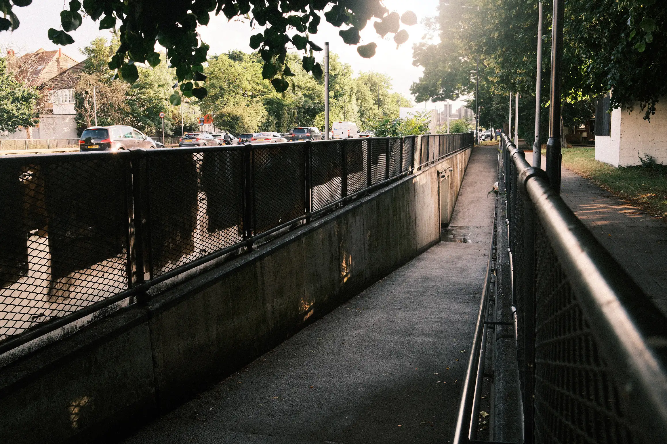 a photo of an underpass looking down the ramp towards the tunnel entrance