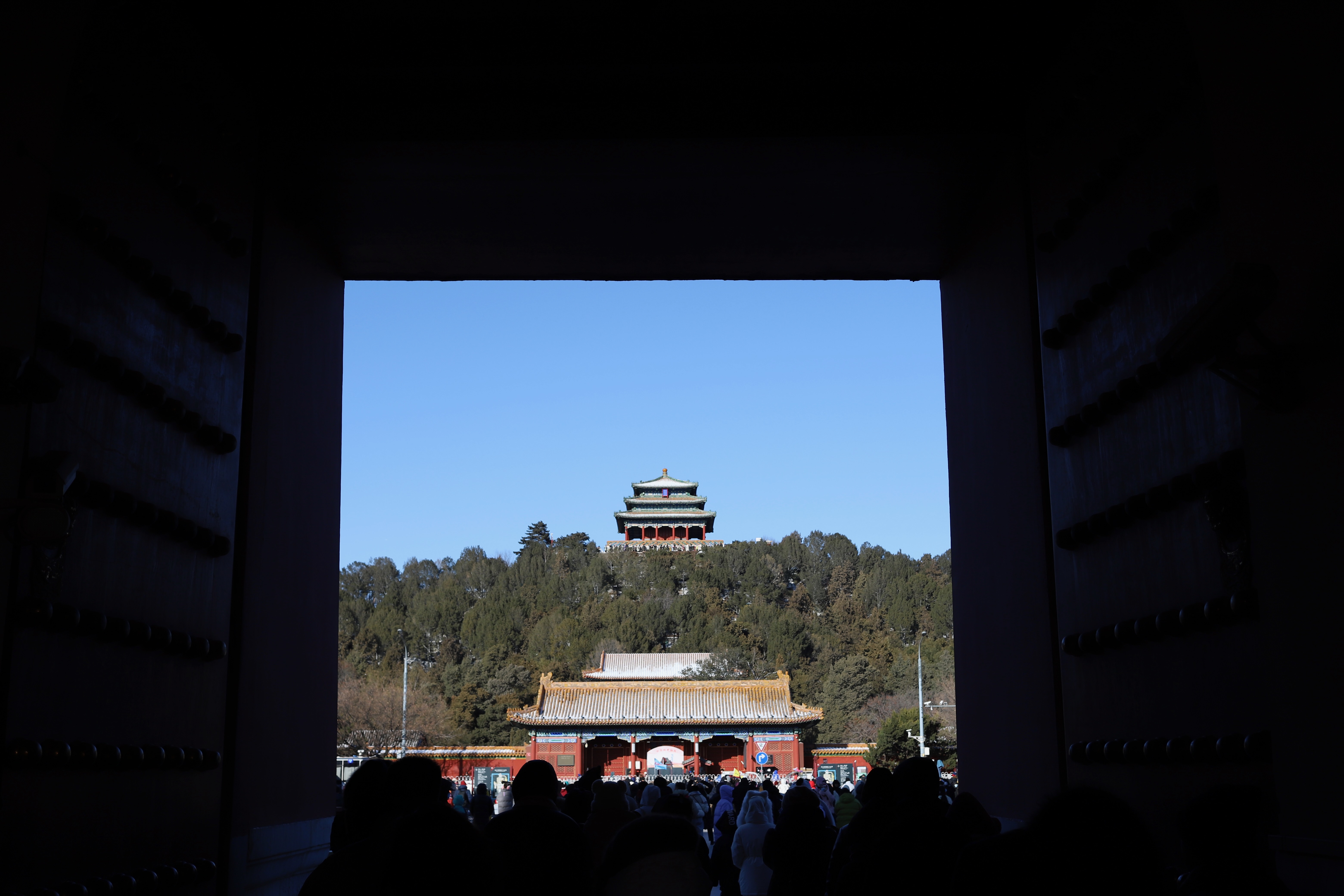 Looking up at Jingshan Park from the north gate of the Forbidden City.